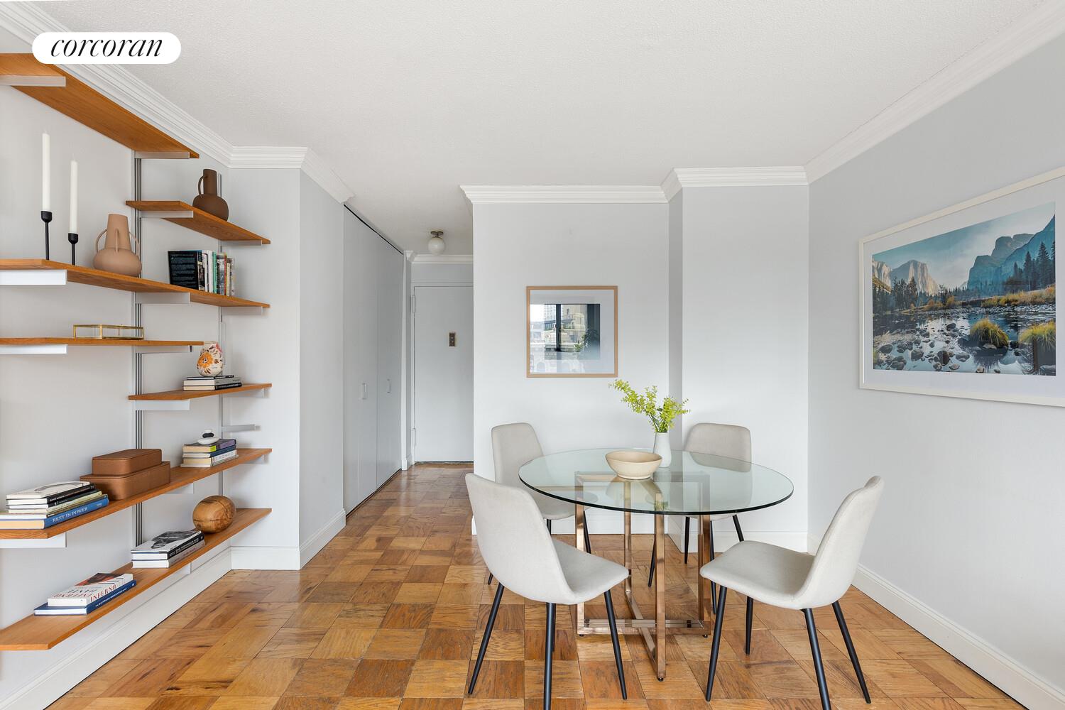 2025 Broadway, Unit 17F Manhattan, NY 10023 - Photo 5 of 15 a dining room with furniture and window