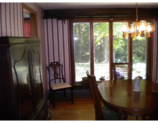 133 Franklin Road Longmeadow, MA 01106 - Photo 3 of 10 a living room with furniture and a floor to ceiling window