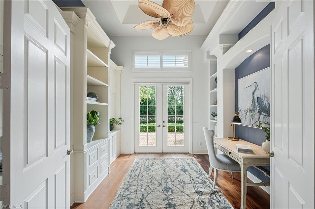 6648 Glen Arbor Way Naples, FL 34119 - Photo 20 of 47 a bedroom with furniture and a window