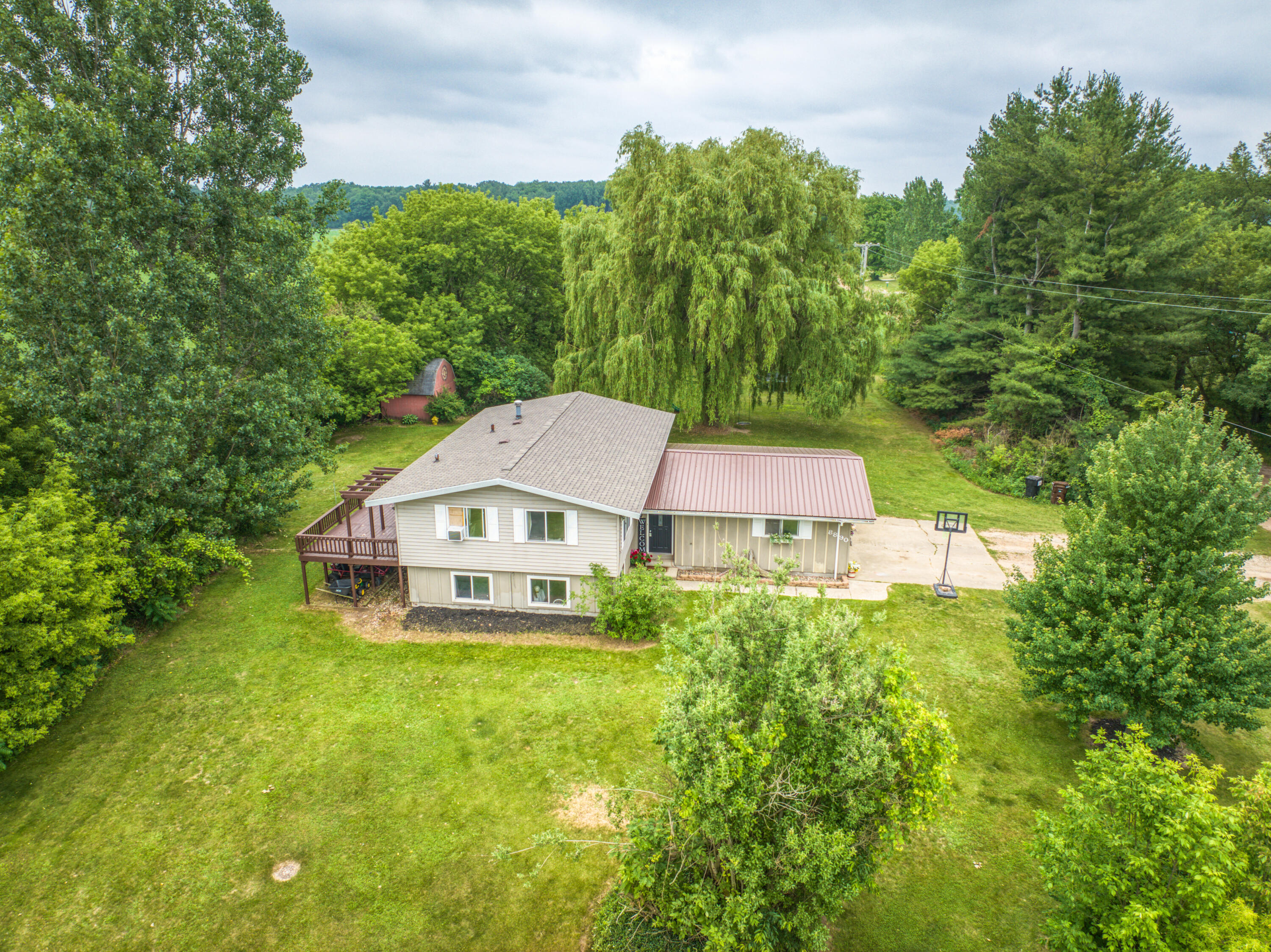 8890 Northwest Lake Road Six Lakes, MI 48886 - Photo 28 of 32 DJI_20260630115447_0942_D_27