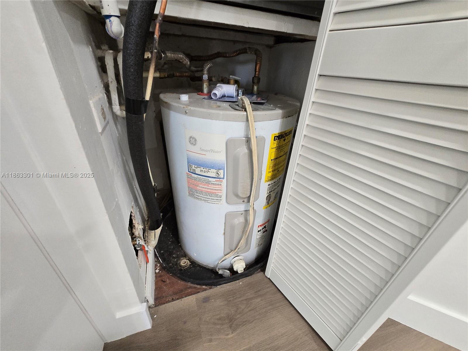 8886 Southwest 3rd Street, Unit 202 Pembroke Pines, FL 33025 - Photo 36 of 36 a view of walk in closet with clothes and shoes