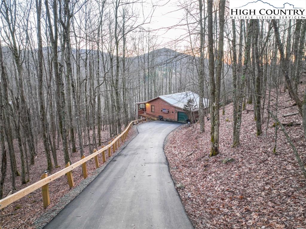 6218 Junaluska Road Boone, NC 28607 - Photo 33 of 33 a view of a balcony with wooden fence