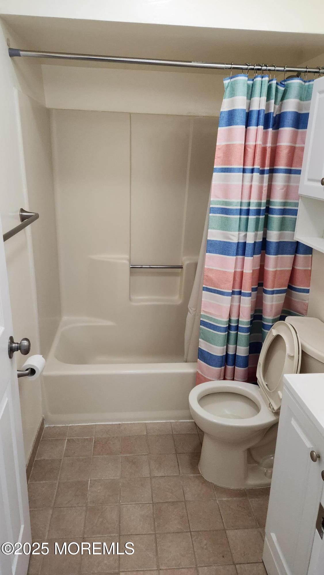 290 North Main Street, Unit B9 Barnegat, NJ 08005 - Photo 6 of 8 a bathroom with a sink a toilet and a shower