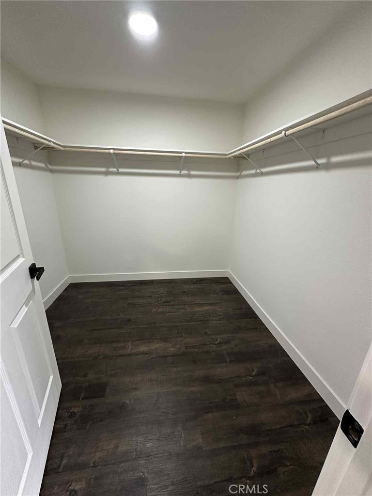 1939 Sierra Court Merced, CA 95340 - Photo 18 of 22 a view of a room with wooden floor and staircase