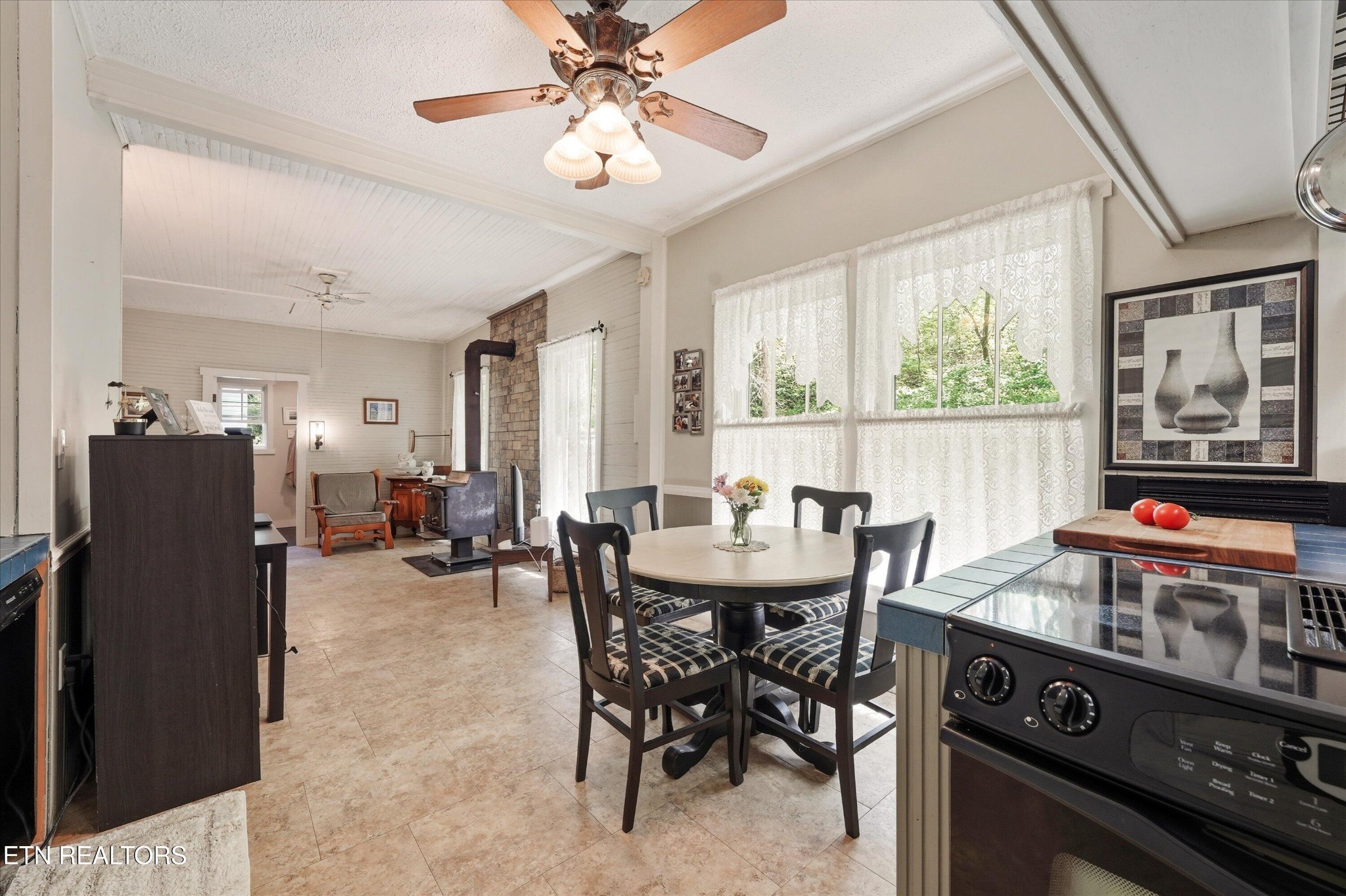 315 Laurel Hollow Road Clinton, TN 37716 - Photo 11 of 40 a view of a dining room with furniture window and outside view