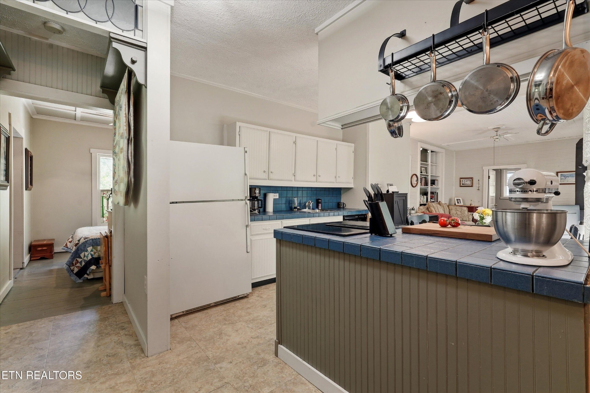 315 Laurel Hollow Road Clinton, TN 37716 - Photo 15 of 40 a kitchen with a refrigerator and a view of living room