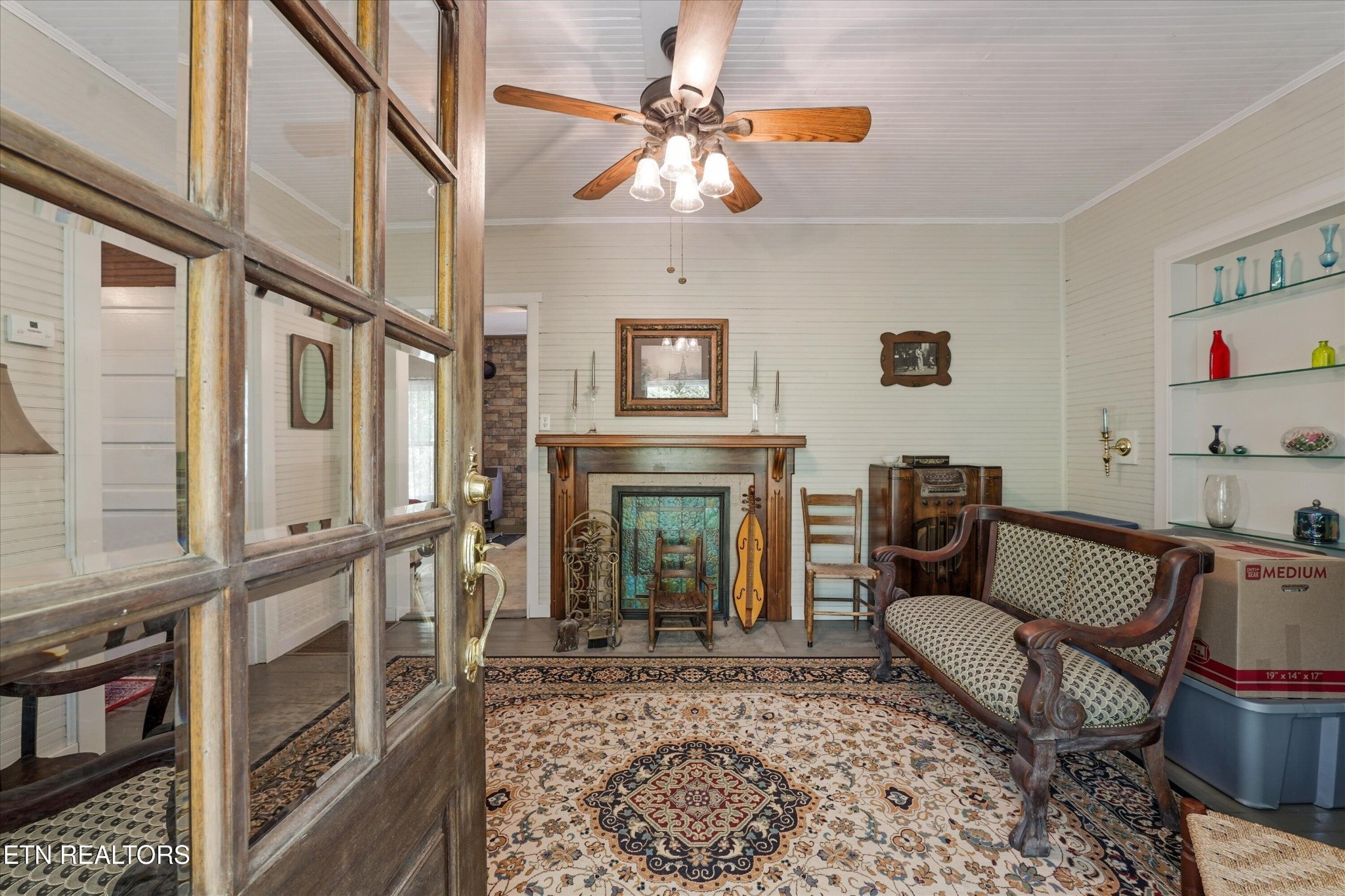 315 Laurel Hollow Road Clinton, TN 37716 - Photo 3 of 40 a living room with furniture and a fireplace