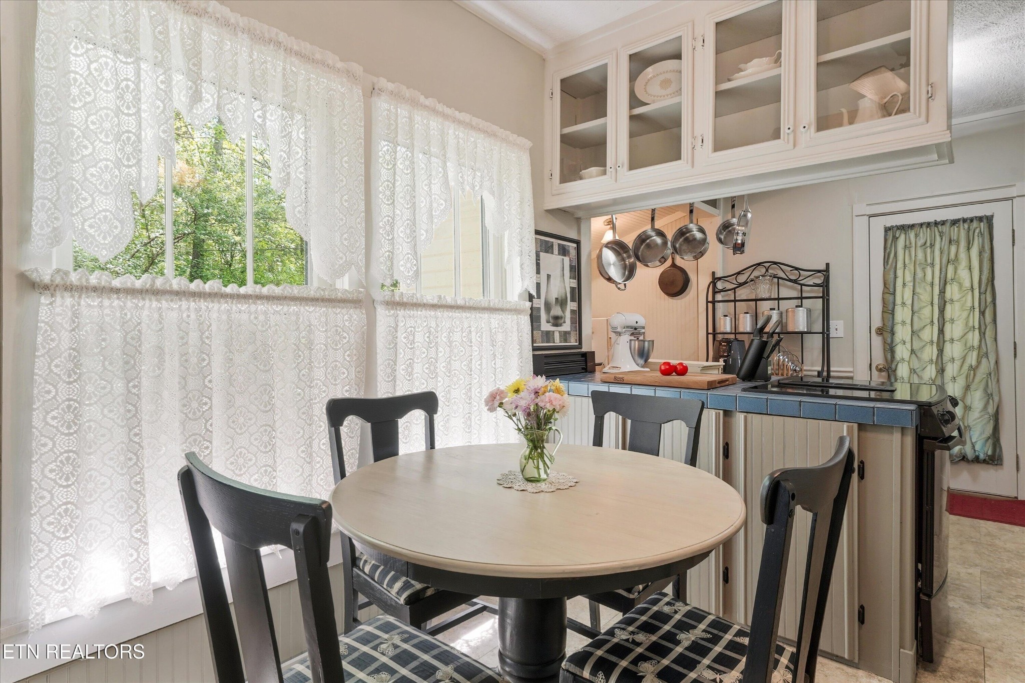 315 Laurel Hollow Road Clinton, TN 37716 - Photo 10 of 40 a view of a dining room with furniture and window