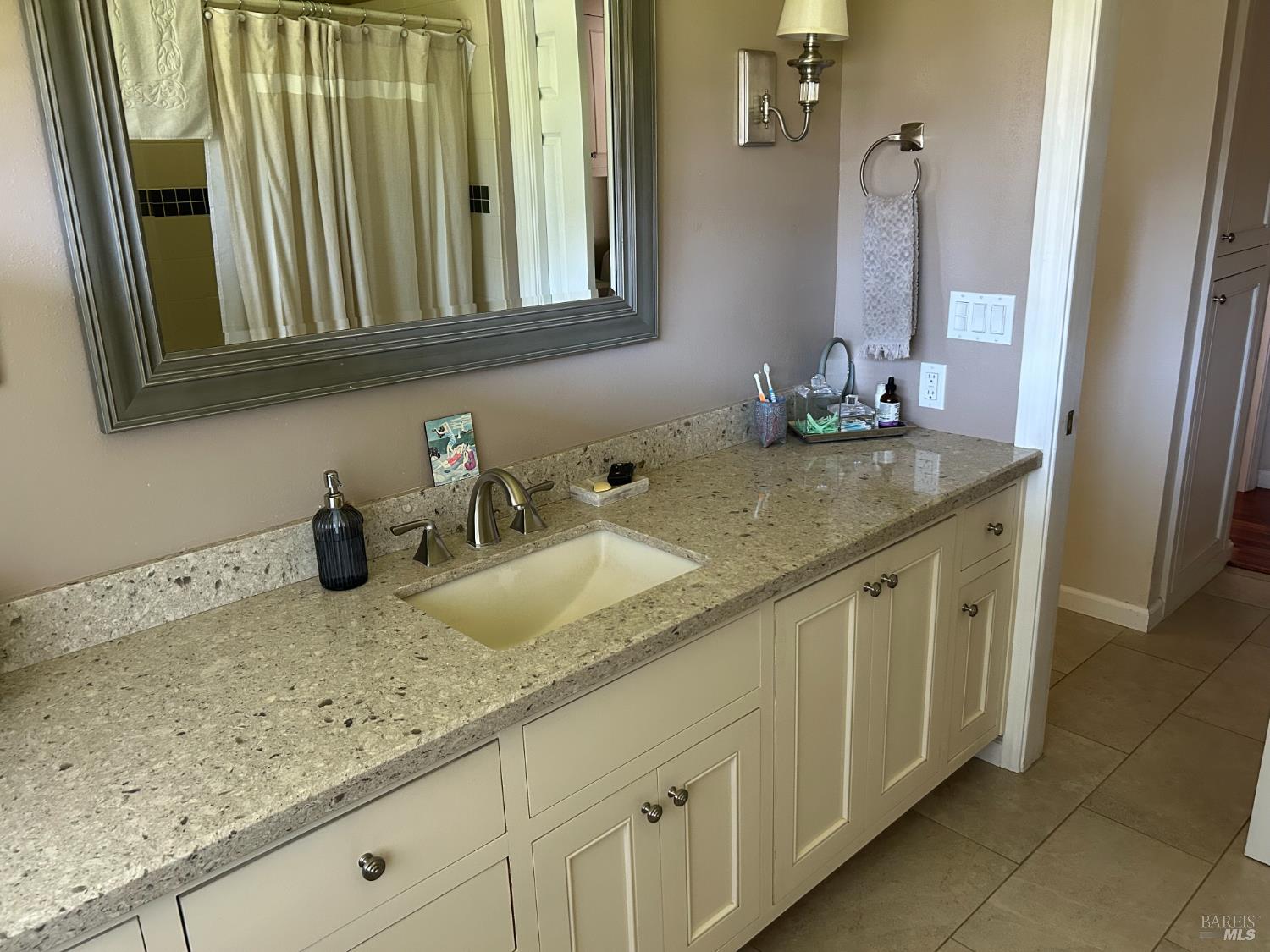 271 White Cottage Road South Angwin, CA 94508 - Photo 14 of 30 a bathroom with a granite countertop sink and a mirror