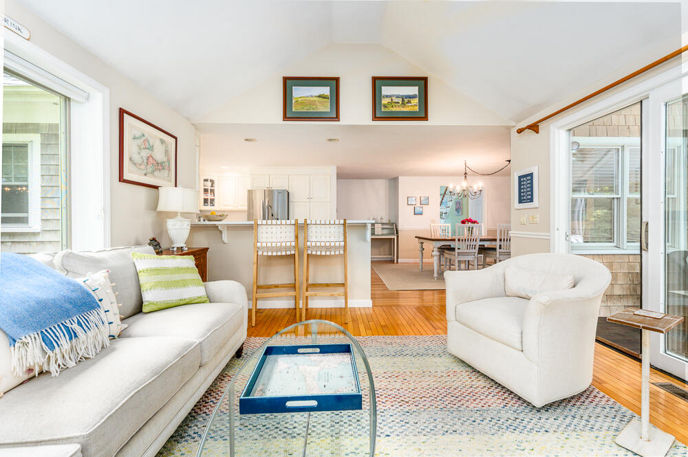 67 Spy Glass Hill Road Barnstable, MA 02675 - Photo 18 of 43 a living room with furniture or couch and a large window