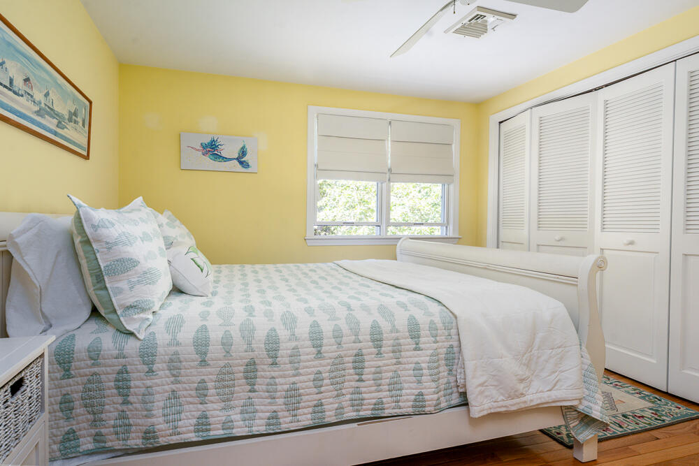 67 Spy Glass Hill Road Barnstable, MA 02675 - Photo 31 of 43 a large bed sitting in a bedroom next to a window