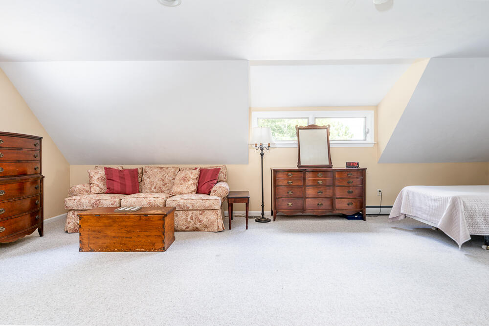 67 Spy Glass Hill Road Barnstable, MA 02675 - Photo 32 of 43 a living room with furniture and a couch