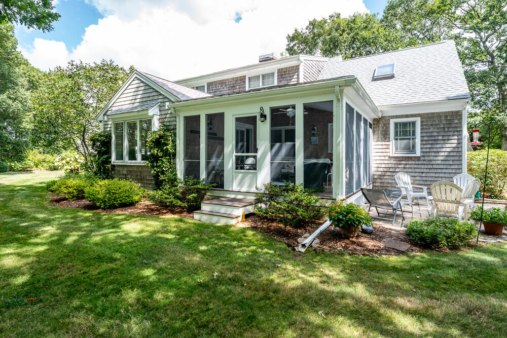67 Spy Glass Hill Road Barnstable, MA 02675 - Photo 39 of 43 a view of a house with a yard and plants