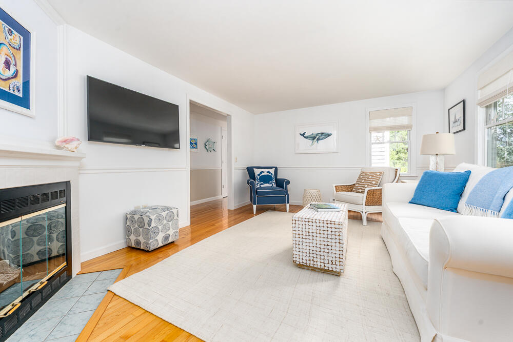 67 Spy Glass Hill Road Barnstable, MA 02675 - Photo 7 of 43 a living room with furniture and a flat screen tv