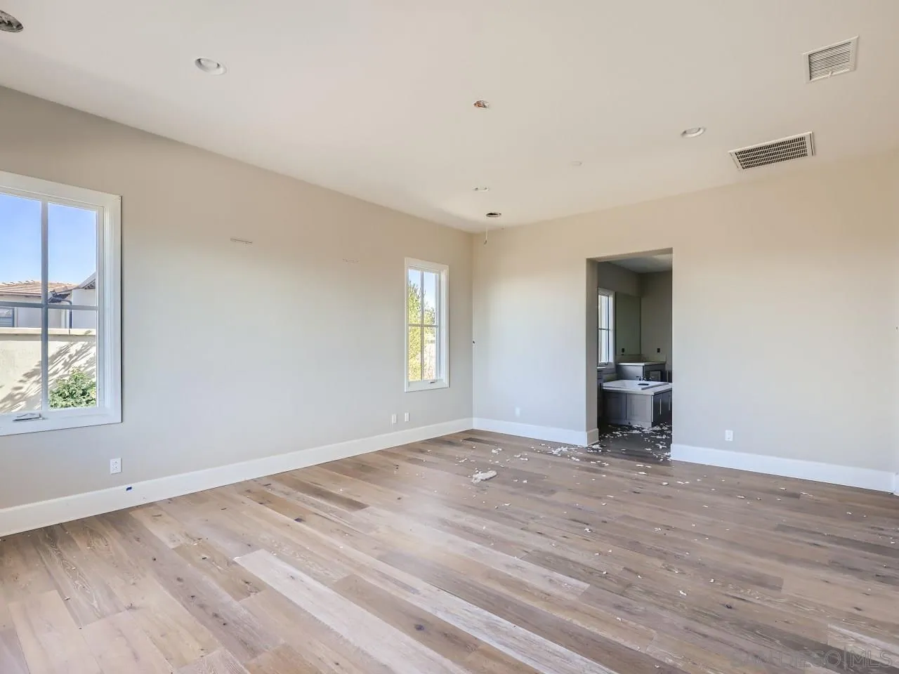 18214 Avenida Apice Escondido, CA 92029 - Photo 14 of 26 wooden floor in an empty room with a window
