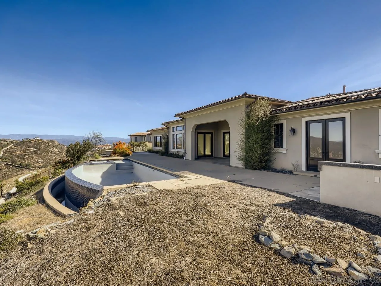 18214 Avenida Apice Escondido, CA 92029 - Photo 24 of 26 a view of a house with a patio