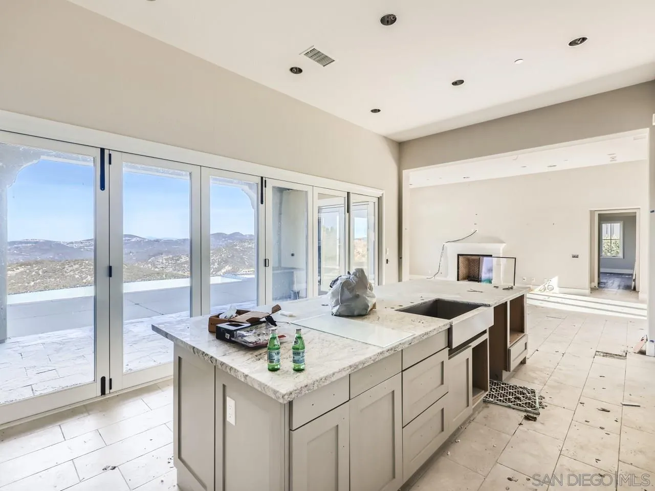 18214 Avenida Apice Escondido, CA 92029 - Photo 4 of 26 a kitchen with counter top space and windows