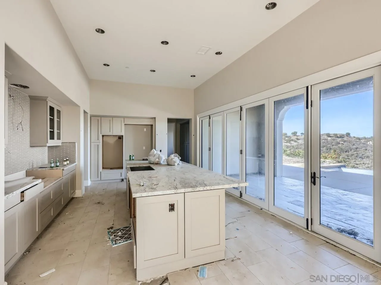 18214 Avenida Apice Escondido, CA 92029 - Photo 5 of 26 a large white room with a granite countertop sink mirror and bathtub