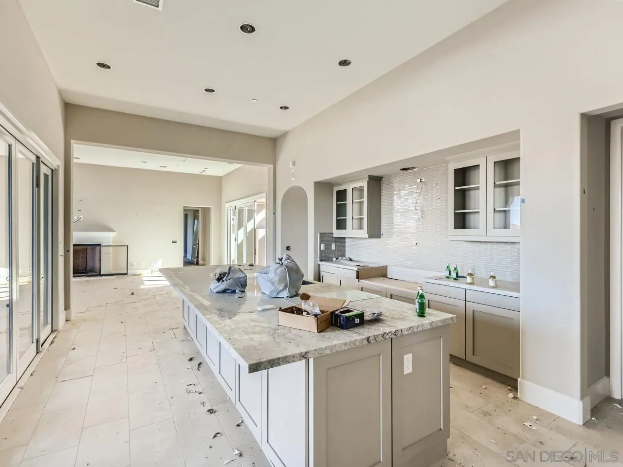 18214 Avenida Apice Escondido, CA 92029 - Photo 6 of 26 a kitchen with sink cabinets and living room