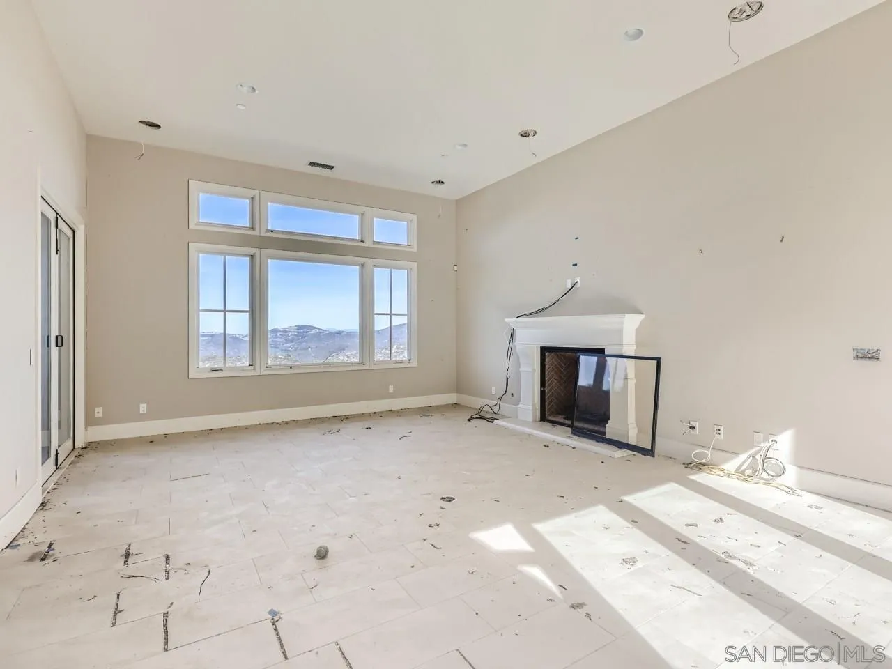 18214 Avenida Apice Escondido, CA 92029 - Photo 8 of 26 a view of a livingroom with wooden floor and a fireplace