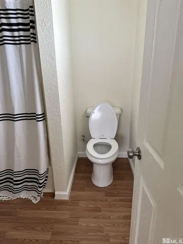 a bathroom with a sink a mirror and a shower