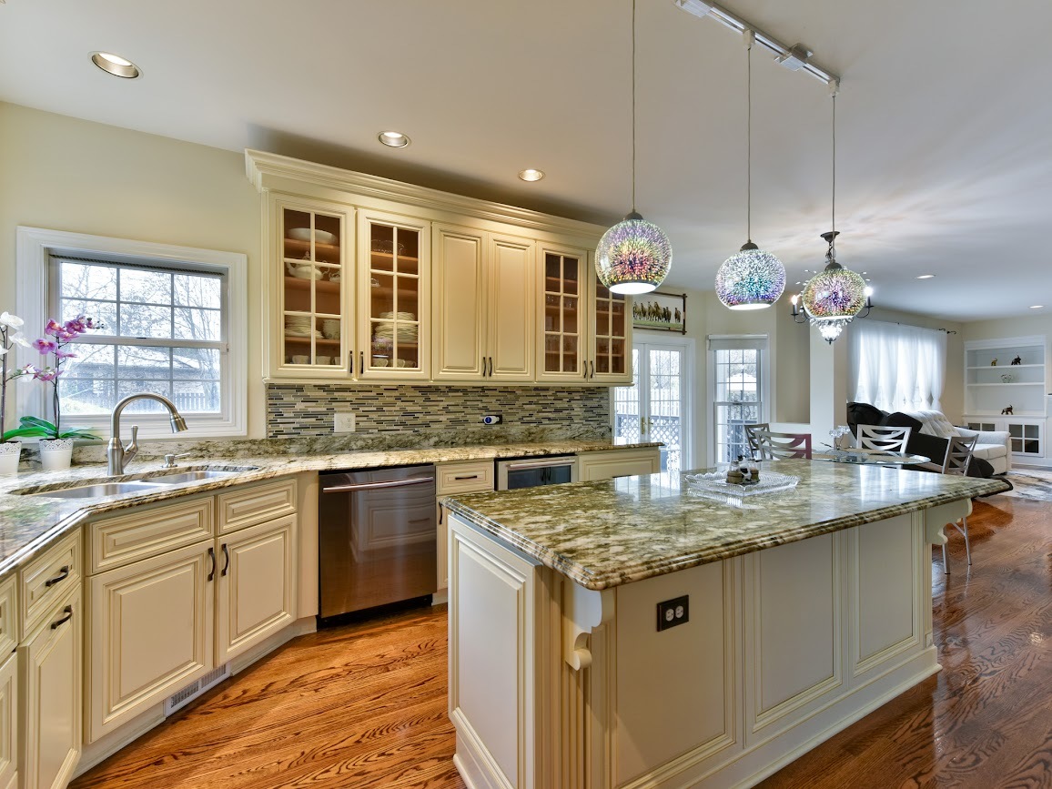 117 Grey Fox Court Streamwood, IL 60107 - Photo 11 of 31 a kitchen with a sink stove and cabinets