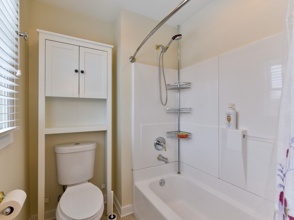 117 Grey Fox Court Streamwood, IL 60107 - Photo 23 of 31 a bathroom with a toilet and a shower