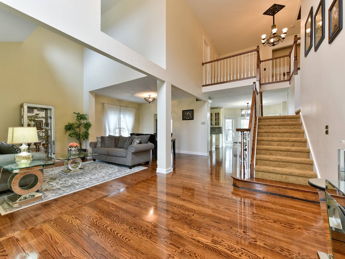 117 Grey Fox Court Streamwood, IL 60107 - Photo 5 of 31 a view of a livingroom with furniture and staircase