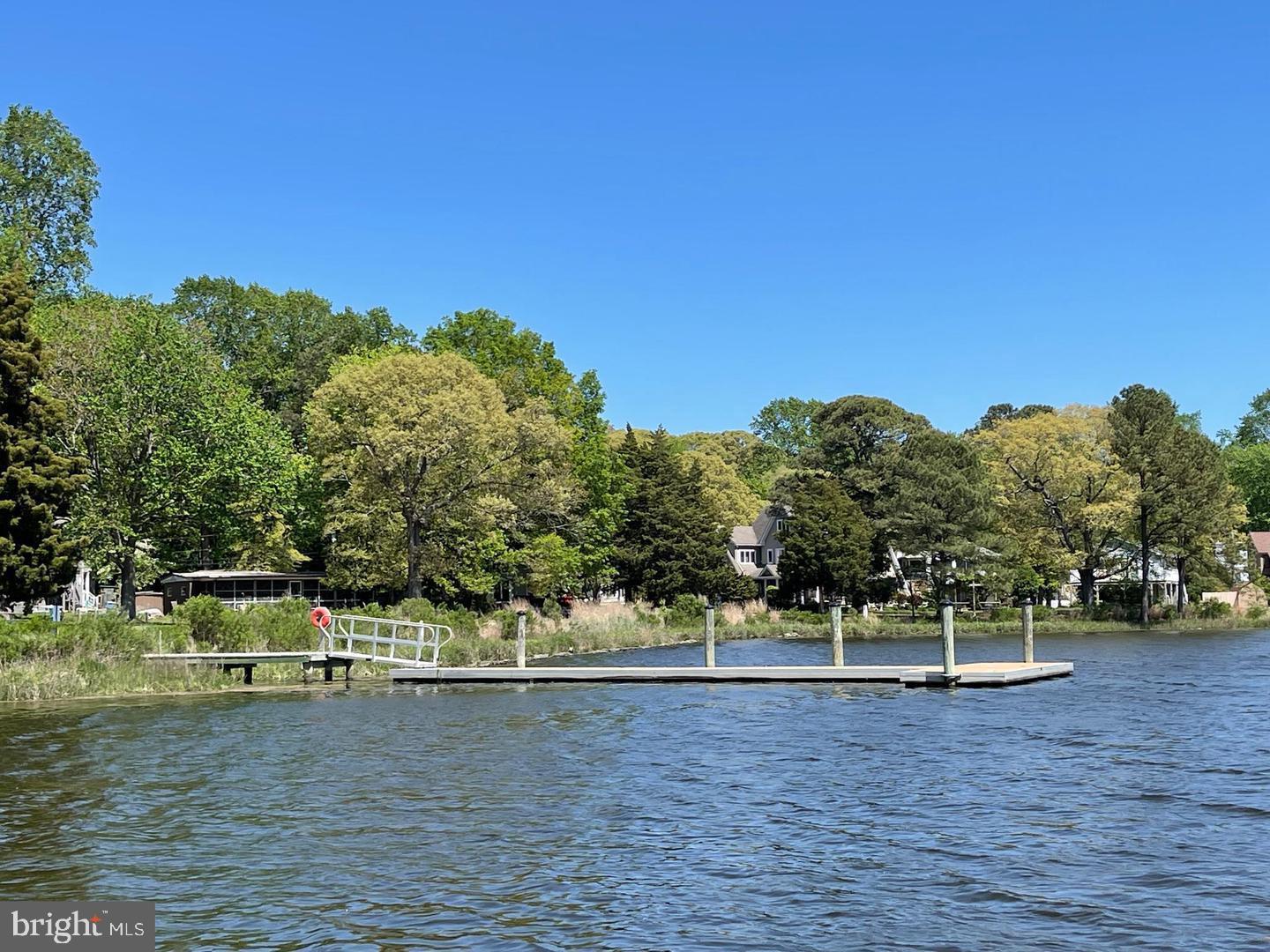 22887 Sycamore Drive Lewes, DE 19958 - Photo 17 of 38 a view of a house with a yard