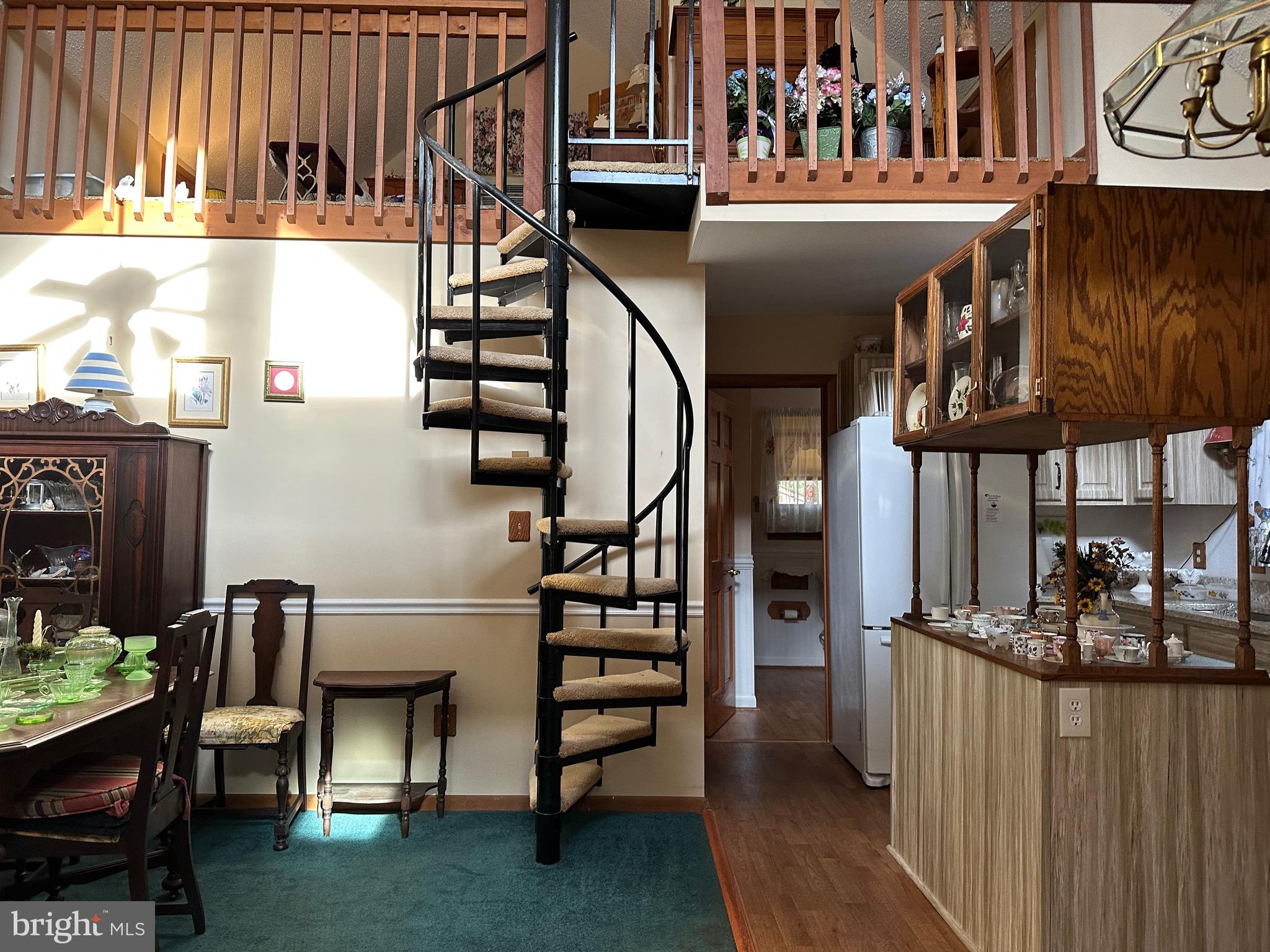 22887 Sycamore Drive Lewes, DE 19958 - Photo 25 of 38 a view of entryway and hall with wooden floor