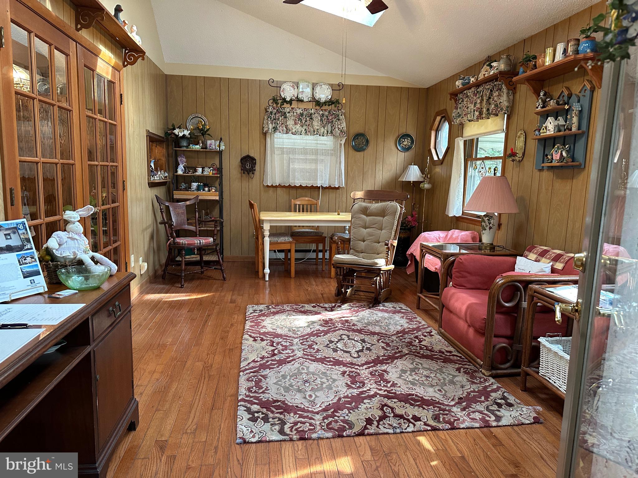 22887 Sycamore Drive Lewes, DE 19958 - Photo 32 of 38 a living room with furniture and a window