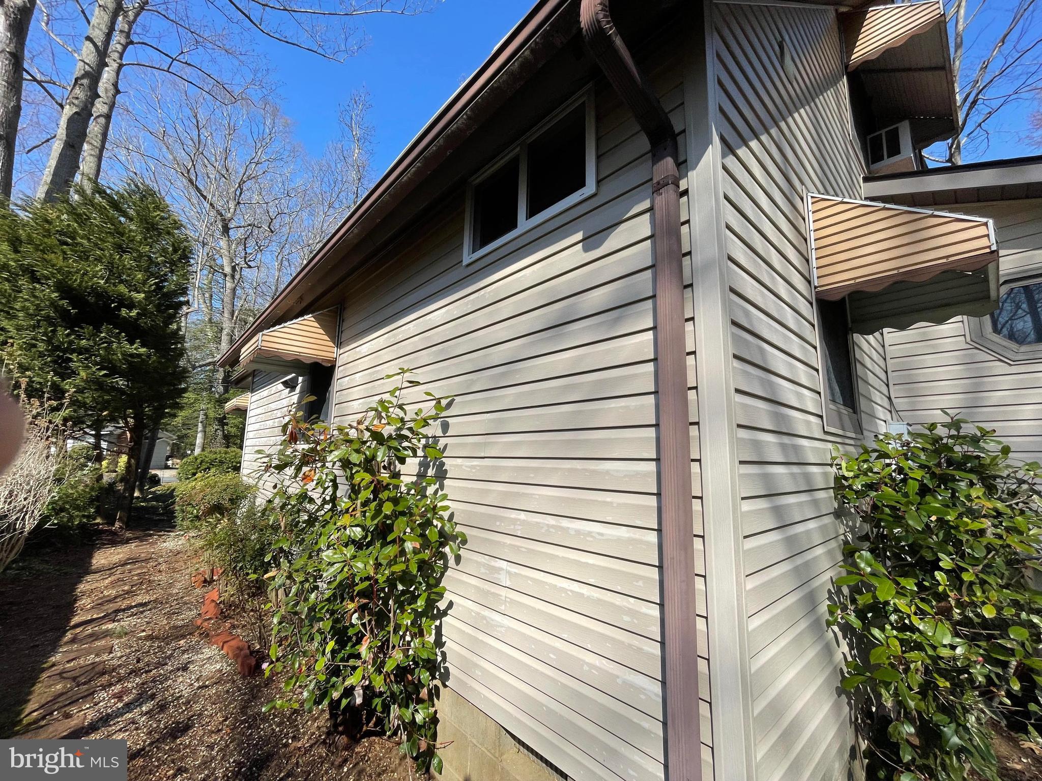 22887 Sycamore Drive Lewes, DE 19958 - Photo 7 of 38 a view of a house with a door