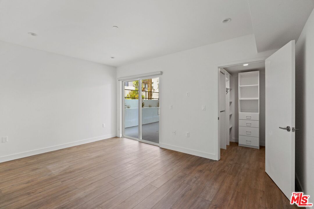 130 South Croft Avenue, Unit 201 Los Angeles, CA 90048 - Photo 7 of 14 wooden floor in an empty room