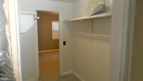 a bathroom with a glass door