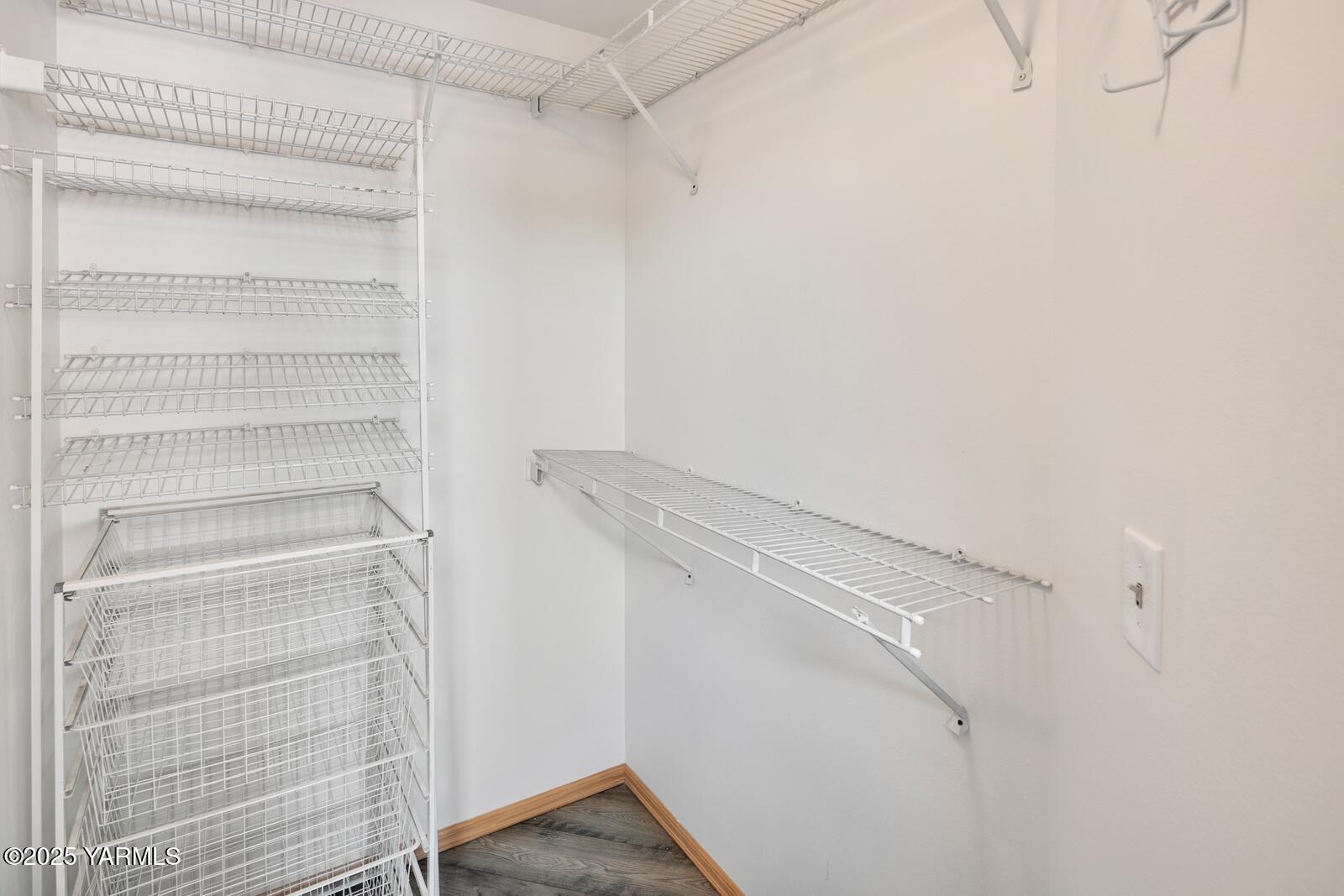23812 21st Drive Southeast, Unit SE Bothell, WA 98021 - Photo 25 of 37 a view of walk in closet with empty racks