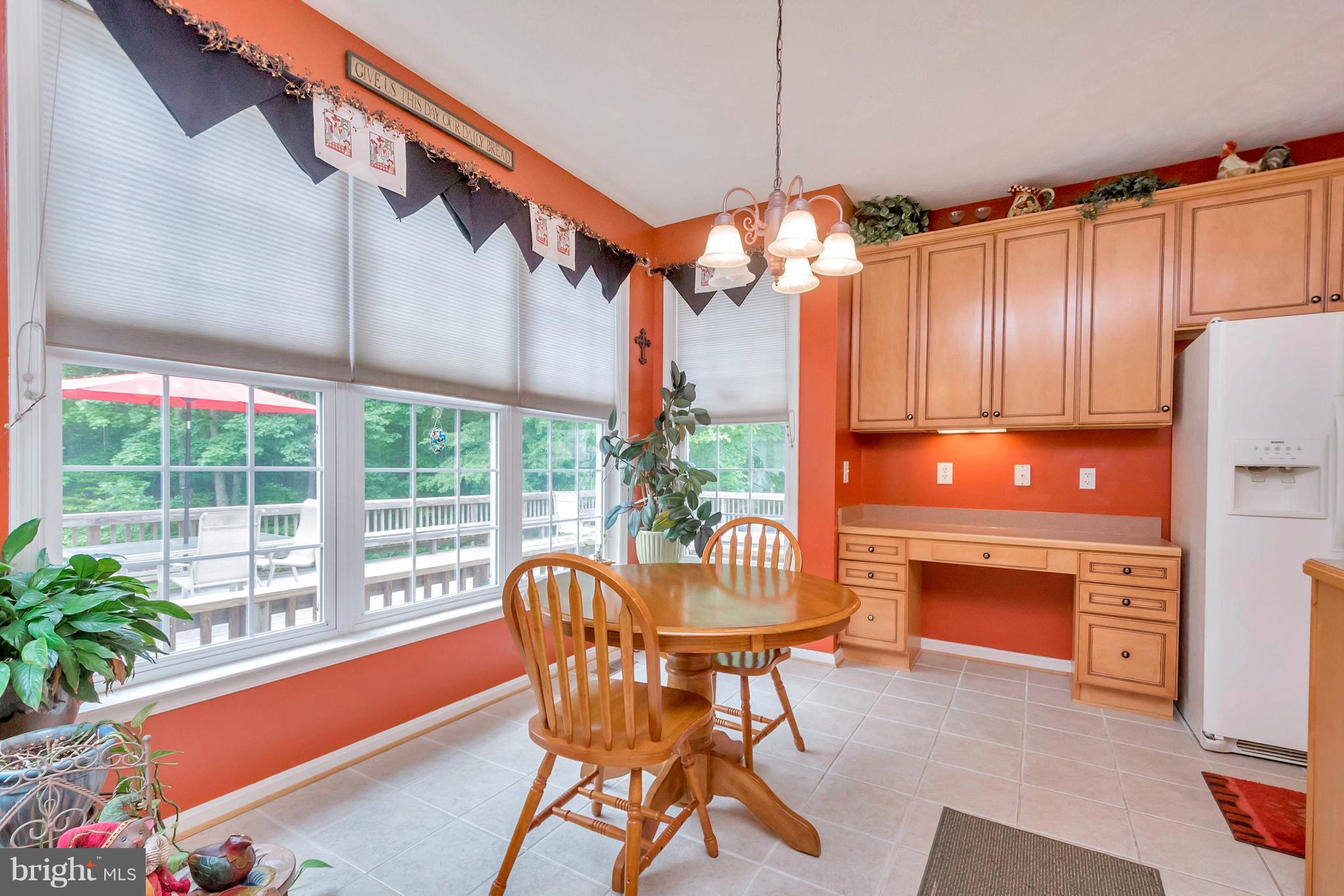 4200 Shepherds Road Partlow, VA 22534 - Photo 3 of 30 a dining room with furniture a chandelier and wooden floor