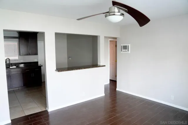 a bathroom with a sink toilet vanity and tub