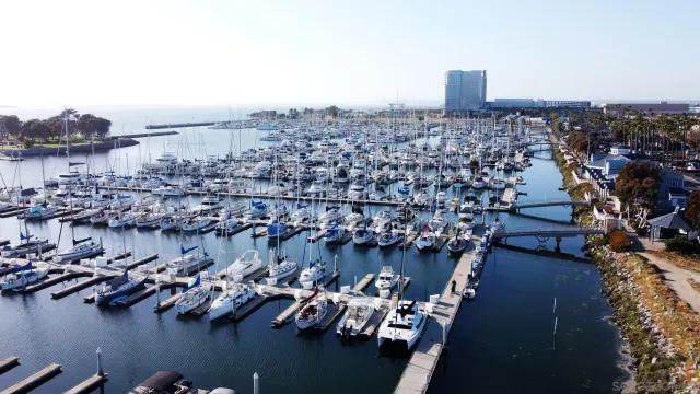 a aerial view of a house with a yard table and chairs