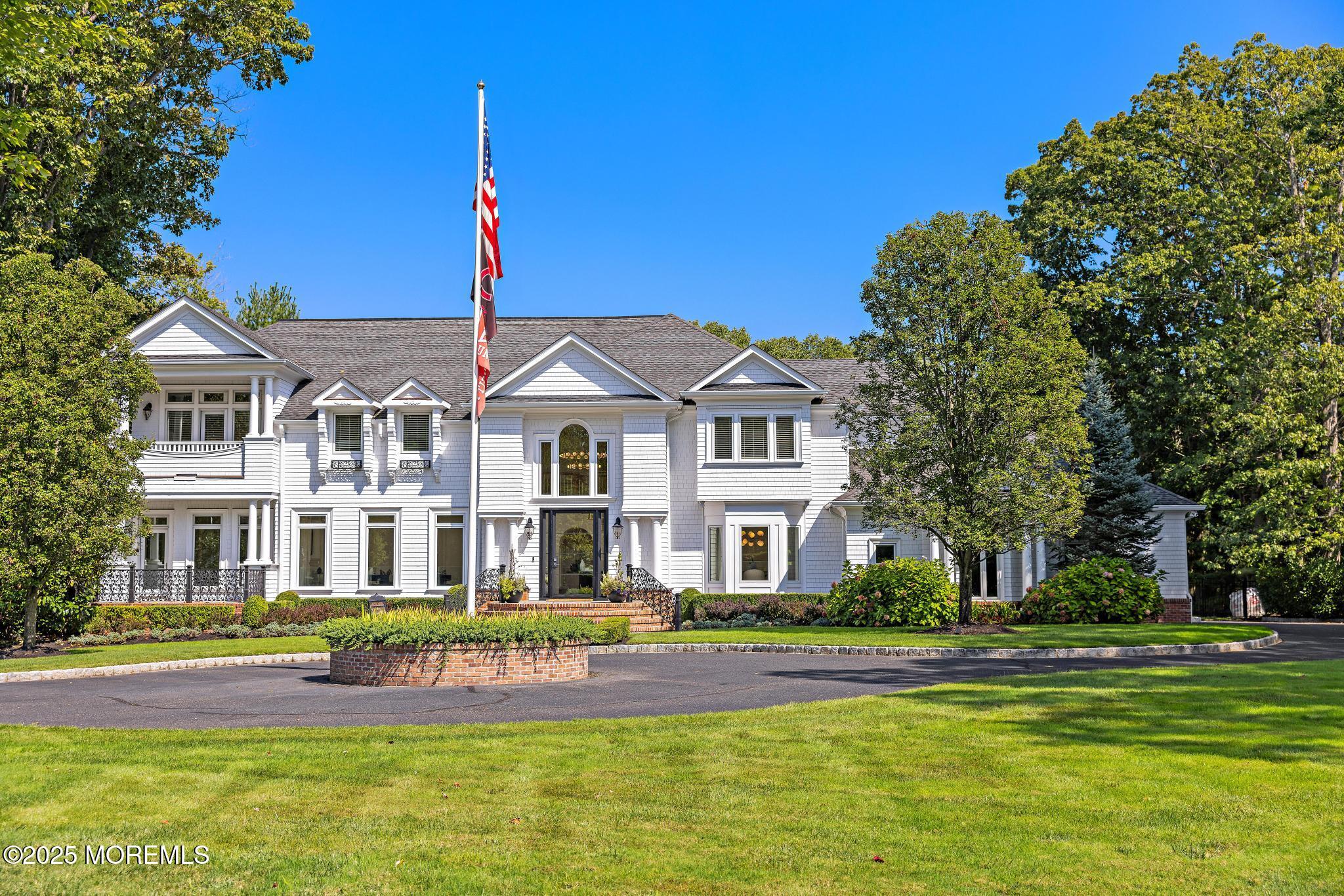a front view of a house with a swimming pool