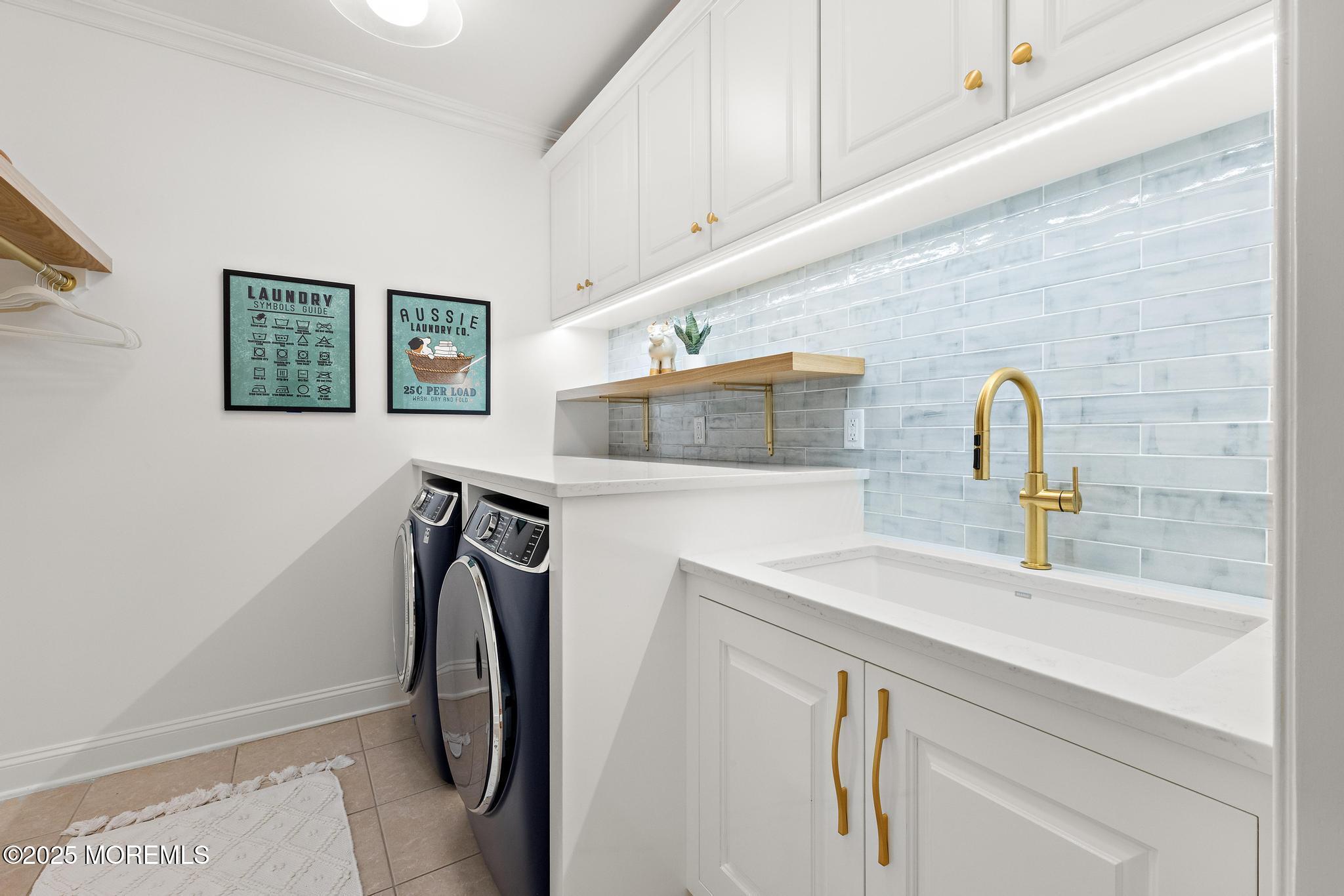 129 Ave Of Two Rivers Rumson, NJ 07760 - Photo 12 of 55 a bathroom with a sink and a mirror