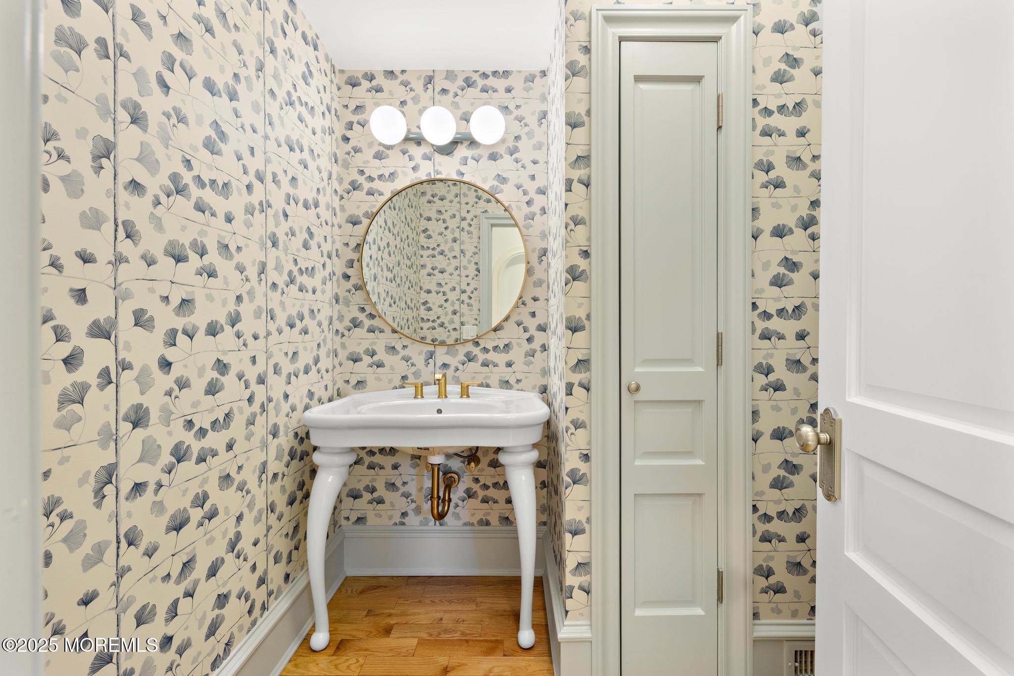 129 Ave Of Two Rivers Rumson, NJ 07760 - Photo 15 of 55 a bathroom with a sink toilet and shower