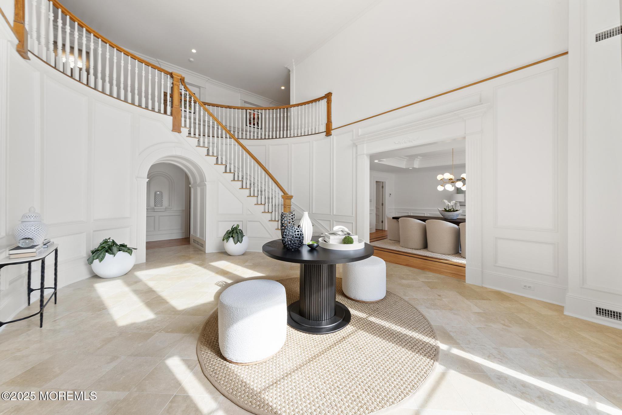 129 Ave Of Two Rivers Rumson, NJ 07760 - Photo 27 of 55 a view of a living room and dining room