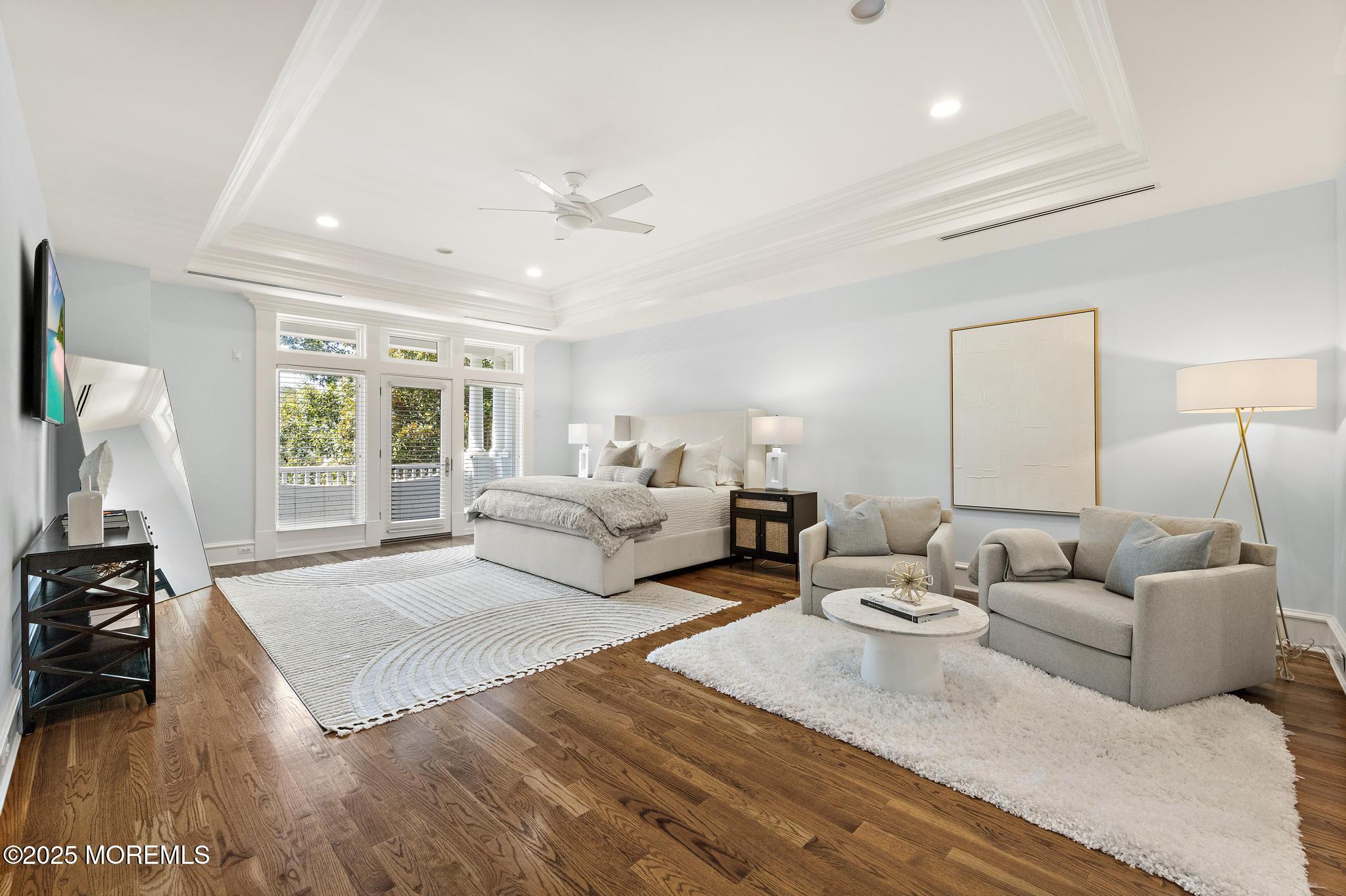 129 Ave Of Two Rivers Rumson, NJ 07760 - Photo 31 of 55 a living room with furniture window and a flat screen tv