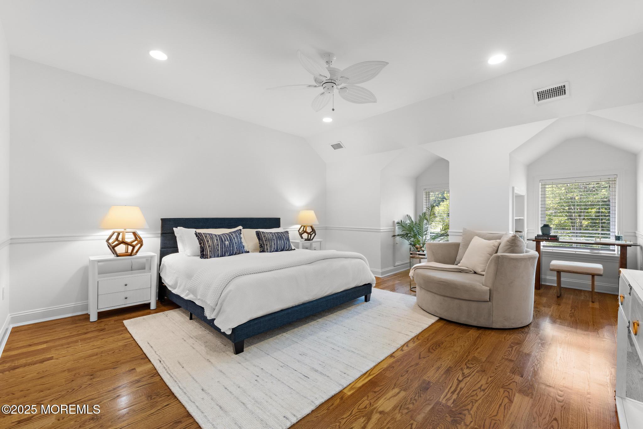 129 Ave Of Two Rivers Rumson, NJ 07760 - Photo 37 of 55 a living room with furniture and a wooden floor