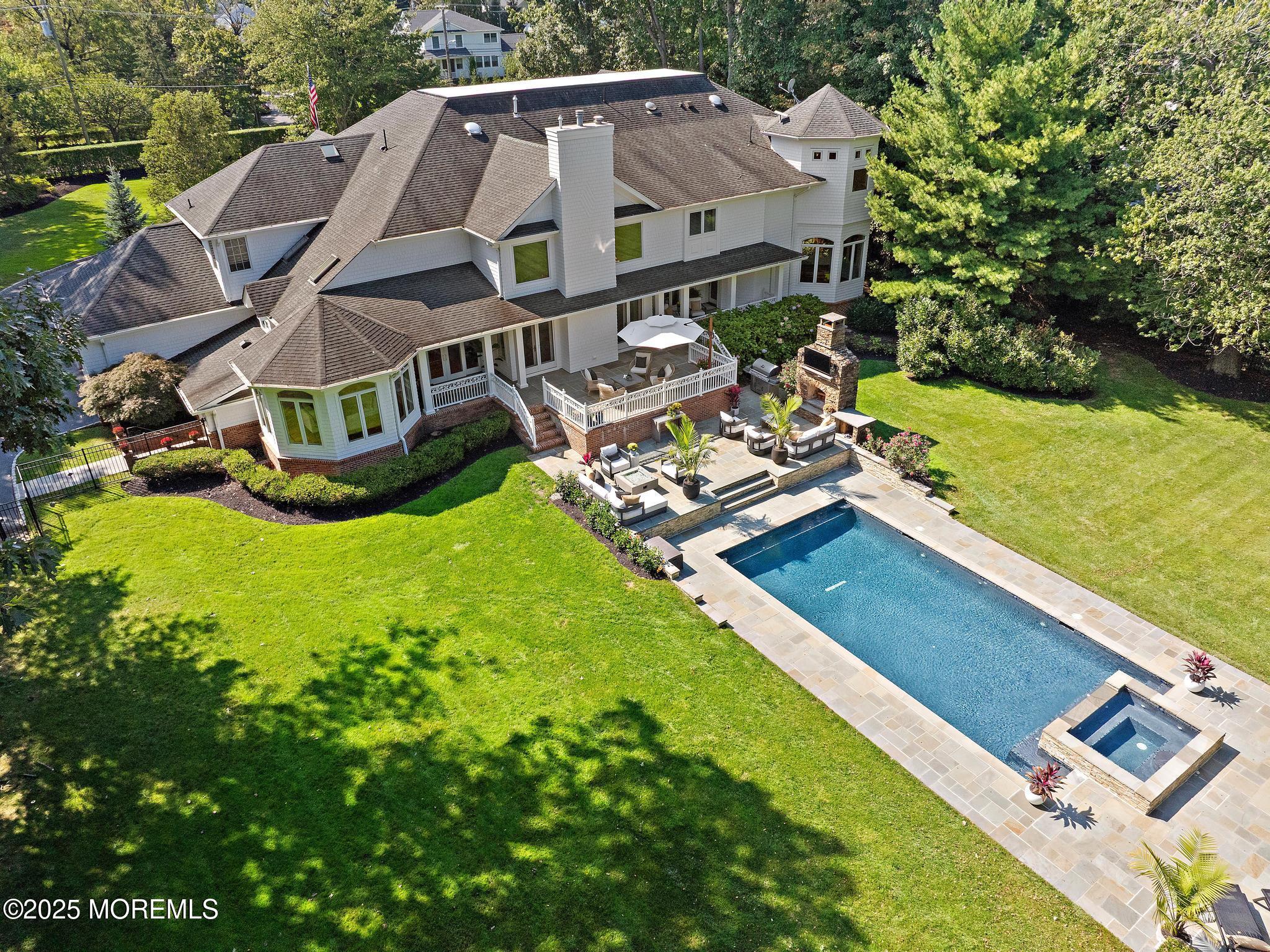 129 Ave Of Two Rivers Rumson, NJ 07760 - Photo 4 of 55 an aerial view of a house with a big yard