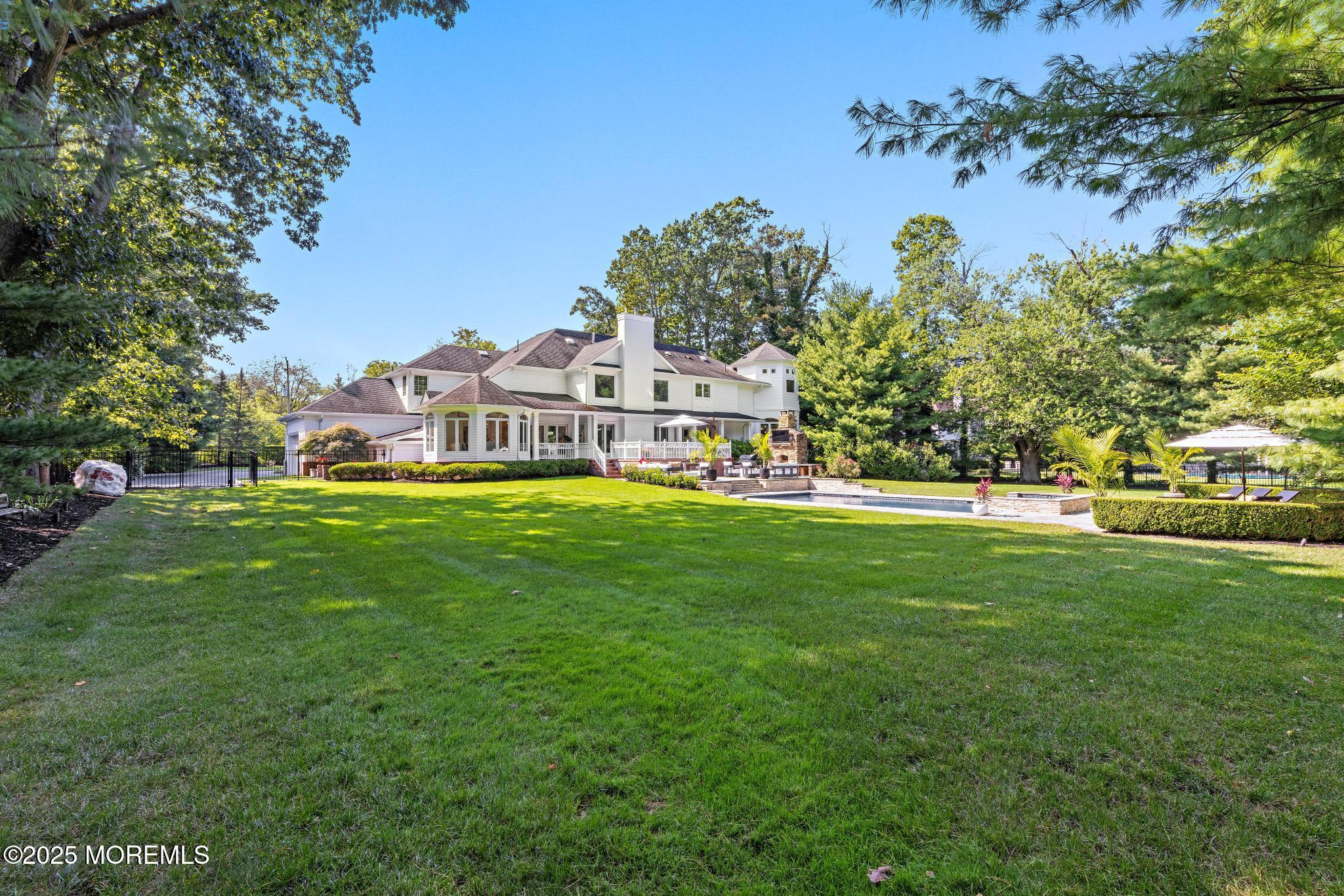 129 Ave Of Two Rivers Rumson, NJ 07760 - Photo 53 of 55 a view of a house with a big yard