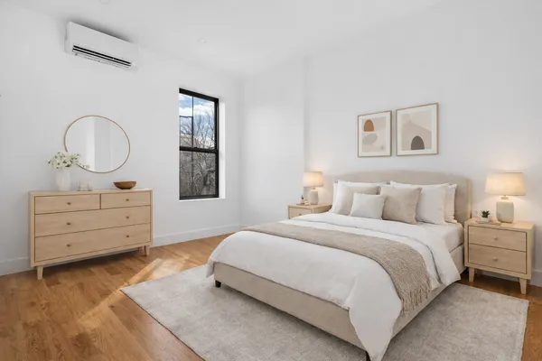 a kitchen with stainless steel appliances a refrigerator and a stove top oven