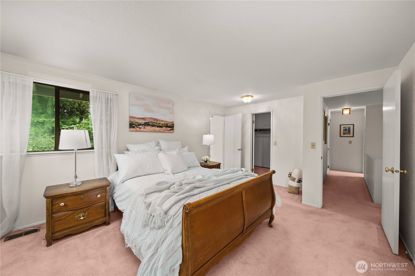 3811 South 255th Place Kent, WA 98032 - Photo 14 of 30 a spacious bedroom with a bed and a table