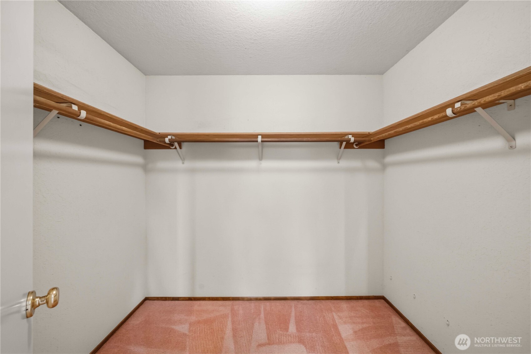 3811 South 255th Place Kent, WA 98032 - Photo 15 of 30 a view of a room with wooden floor