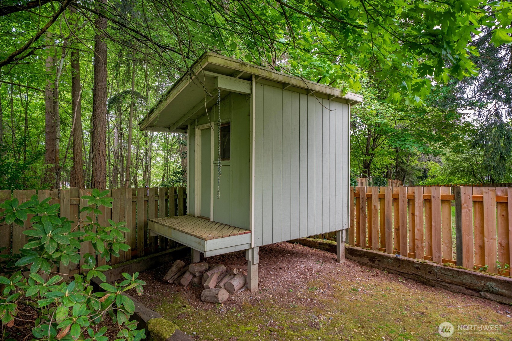 3811 South 255th Place Kent, WA 98032 - Photo 26 of 30 a backyard of a house with seating space